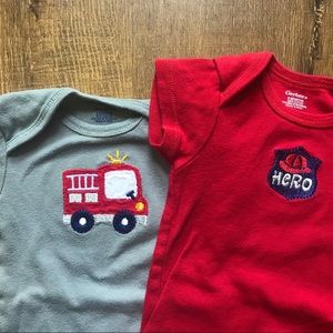 Firefighter-themed baby onesies